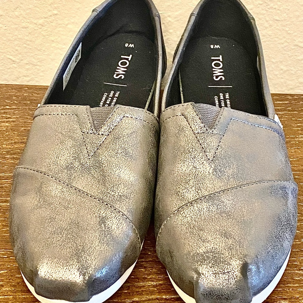 Barely worn gray/silver iridescent Toms, s…